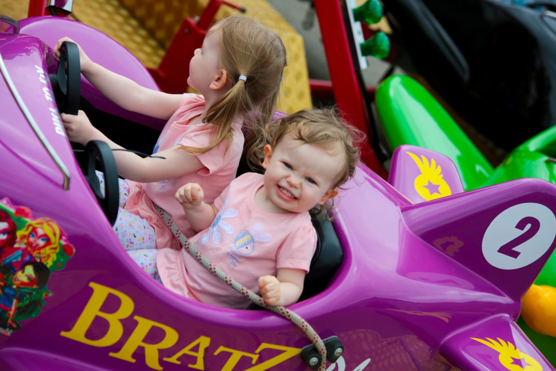 2 children on a ride at hop farm family park