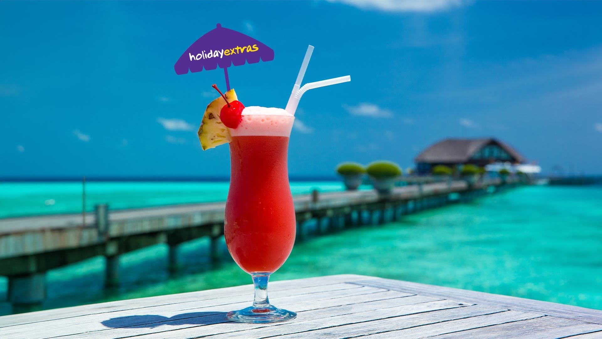 cocktail in the sun infront of a pool