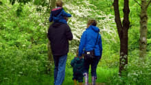 Family walking at Baddesley Clinton