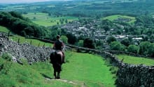 Woman horse riding on Pennine Bridleway National Trail in Kirkby Stephen