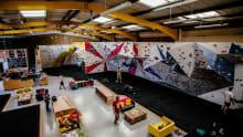 Climbing walls and seating area at The Climbing Lab in Leeds