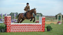 Woman horse riding at Cotswolds Riding in Stanton