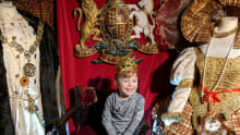 Boy wearing crown at Tudor World in Stratford-upon-Avon
