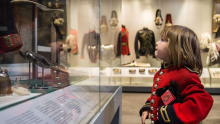 Boy in costume at The Household Cavalry Museum in London