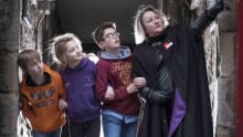 Guide and kids at Advocate's Close in Mercat Tours in Edinburgh