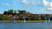 People sailing at James Hamilton Heritage Park in East Kilbride