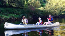 Family canoeing at Wyedean Canoe and Adventure Centre in Ross on Wye