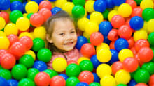 Girl in ball pit at Blue Kangaroo Play and Party Centre in Hull