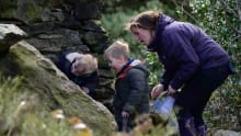 Family in the garden at Stoneywell, Leicestershire