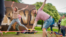 People walking on rope at Howard Park and Gardens in Letchworth
