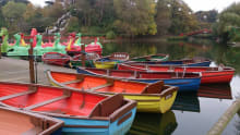 Paddling boats on lake in Peasholm Park in Scarborough