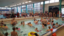 Families in swimming pool at Grangemouth Pool