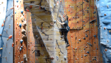 Girl climbing indoors