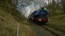Steam train travelling at Embsay and Bolton Abbey Steam Railway in Skipton