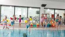 Kids jumps into swimming pool at Michael Woods Sport and Leisure in Glenrothes