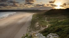 Sunrise at Oxwich Bay Beach in Swansea