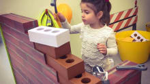 Girl roleplay constructing at Little Street West Byfleet in Surrey