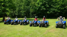 Kids on quad bikes at Arena Pursuits in Wadhurst
