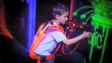 Boy playing laser tag at Jungleland Telford