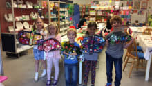 Kids with finished crafts at Glazydayz Pottery in Ledbury