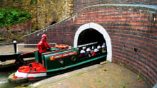 Passengers on canal boat at Dudley Canal Tunnels in Dudley