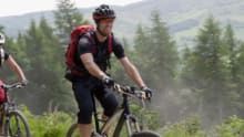 Couple cycling at 7stanes Glentress in Peebles