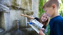 Kids looking for clues on Treasure Trail