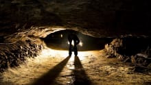 Man in Peak Cavern in Castleton