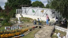 Family looking at miniature village at Railworld in Peterborough