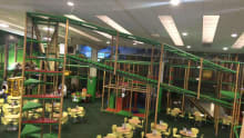 Indoor soft play frame and cafe area at Rainforest Adventure East Kilbride