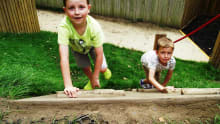 Kids playing at Whisby Nature Park in Thorpe on the Hill
