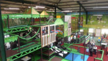 Indoor soft play frame and cafe area at Pandamonium Play Centre in Erskine