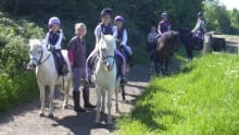 People horse riding at Barrow Hall Stables in Bury St Edmunds