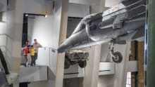 Family at IWM London looking at giant planes