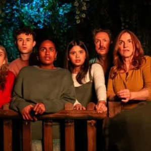 Group of guests look amazed during a dramatic scene in Jeff Wayne’s War of the Worlds immersive adventure, available with Jeff Wayne’s War of the Worlds tickets.