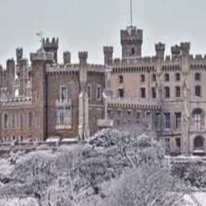 Historic castle on a hilltop surrounded by countryside