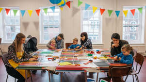 Families making crafts at Broadway Studio & Gallery in Letchworth