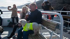 Family and dog on Jacobite Loch Ness Cruises in Inverness