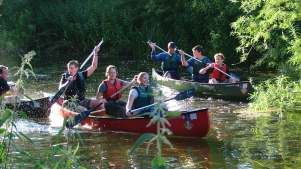 Families canoeing at Wear Canoes in Durham