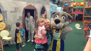 Family and mascot at Fun2B in Warrington