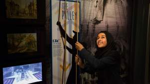 Girl trying out pulley at Royal Shakespeare Company in Stratford upon Avon