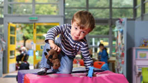 Boy playing at The Yard Stamford