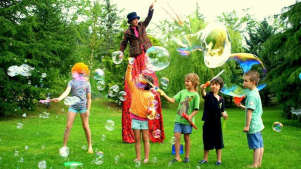 Kids playing with bubbles at Howard Park and Gardens in Letchworth
