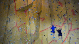 People rock climbing at Dynamic Rock in Swansea