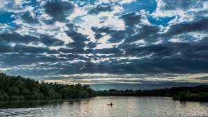 Person canoeing at Horseshoe Lake Activity Centre in Sandhurst