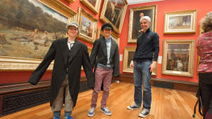 Boys in costumes in Victoria Gallery at The McManus Art Gallery and Museum in Dundee