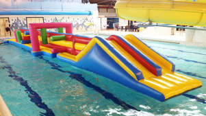 Inflatable course at Pendle Wavelengths Swimming Pool in Nelson
