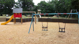 Outdoor playground at Frimley Lodge Park and Miniature Railway in Camberley