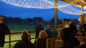 People in outside seating area at Reload in Reading