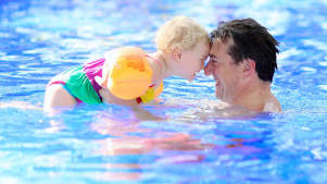 Father and daughter in swimming pool at Larkfield Leisure Centre in Aylesford